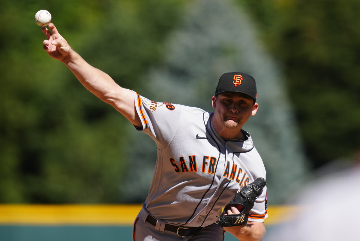 SF Giants starting pitcher Keaton Winn delivers against the Colorado Rockies in the first inning at Coors Field on September 16, 2023.